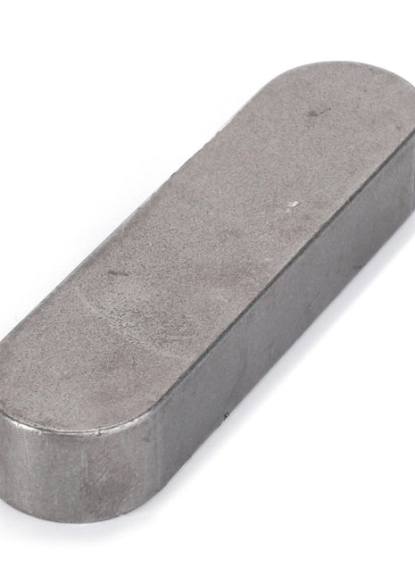 The AGCO | KEY - D43110600 is a small, rectangular metal piece with rounded edges and a smooth, flat surface.