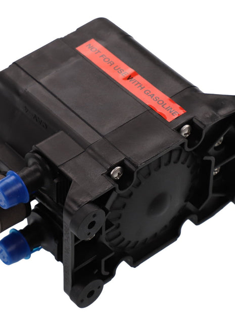 This AGCO | Pump - Acw0781270, a black plastic mechanical component with connectors, is prominently labeled with red tape warning, "NOT FOR USE WITH GASOLINE." No current product description information is available.