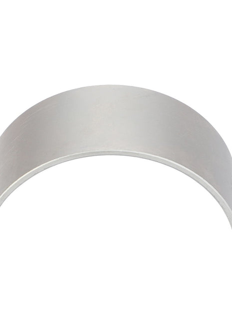 This is a curved metallic object with a smooth surface, resembling a partial cylindrical shell. It is known as the AGCO | Connecting Rod Bearing - F716201310260, produced by the brand AGCO.