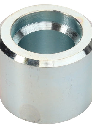 An AGCO spacer (model D28385557), a cylindrical steel component with a threaded inner surface, is placed upright on a white background.
