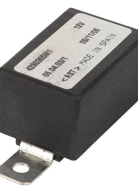 The AGCO | Relay, 12 V - 4280365M1 is a rectangular black electronic component with a white label on top displaying its specifications and marked "Made in Spain." It features a metal tab protruding from one end. This AGCO Parts Genuine Electrics item ensures optimal operating safety and extends service life.