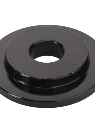 A black metal disc with a central hole and a raised outer edge, viewed from above. Product: AGCO | Washer - Acw0051170. Brand: AGCO.