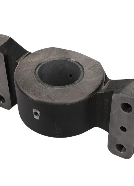 The AGCO Bearing Carrier - 4280122M12 is a metal mechanical component featuring a circular central cavity and two flat, rectangular flanges on either side, each with two bolt holes.