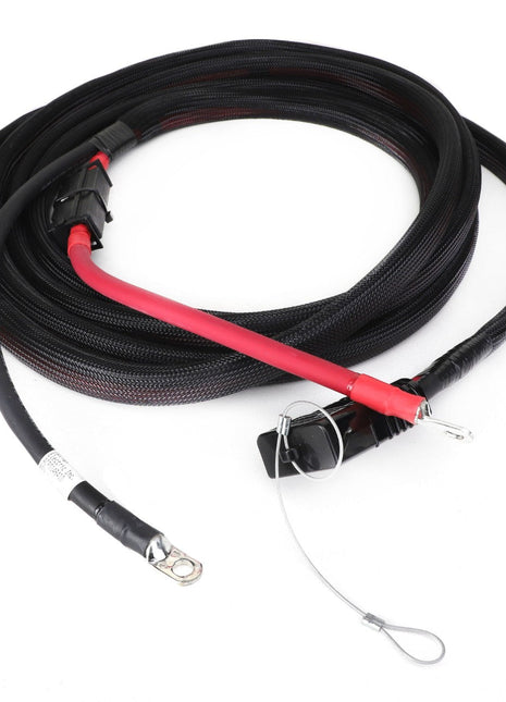 The AGCO Power Supply Wire - Acp0146410 is a coiled black and red battery cable with eyelet terminals and a durable protective sleeve, perfect for reliable connections.