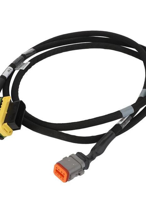 No current product description information is available for the AGCO Rotor Performance Wire Harness - Acx3395240, a black, coiled electrical cable featuring connectors at both ends: one with a multi-pin plug and the other with a rectangular, multi-slot connector.