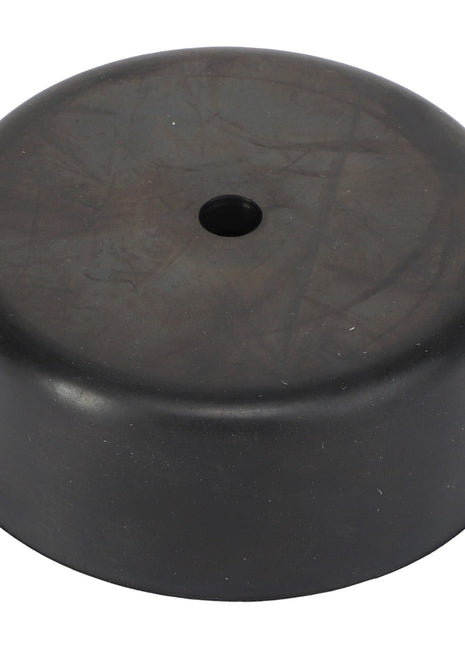 A black, round rubber AGCO Holder - Acw2340950 with a hole in the center viewed from above. No current product description information is available.