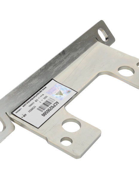 The AGCO | Bracket - Acp0296500 by AGCO is a metal mounting bracket featuring holes for screws and a rectangular label, designed for structural support or attachment purposes.