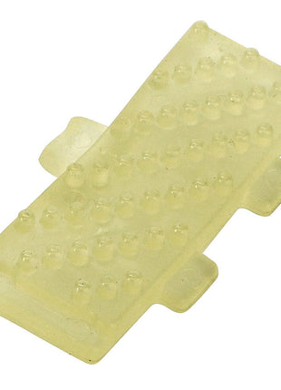 The AGCO | Insert - Acw1442790 by AGCO is a translucent yellow silicone grip pad with a rectangular shape, featuring a grid of small raised dots and tabs on the sides. Please note that no additional product description information is available beyond these details.