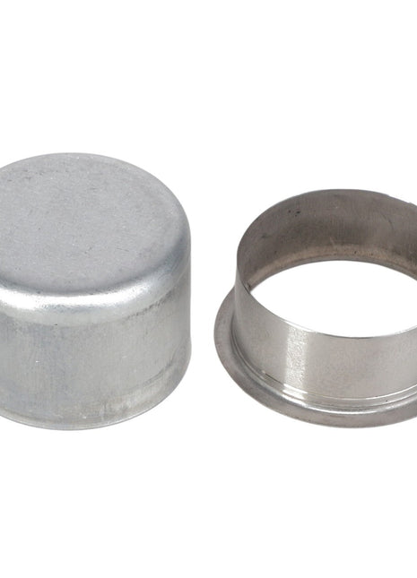 Two metal objects: a cylindrical cap on the left and a circular ring on the right. Both are made from a metallic material, meeting OE quality standards. The product is named AGCO | Sleeve - AG334409, manufactured by the brand AGCO.