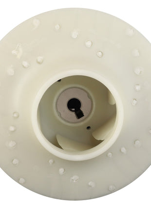 Top view of the AGCO | IMPELLER - AG131494, a white plastic gear with a central hole and dotted indentations along the surface, showcasing both durability and vibration resistance as hallmark features of AGCO Genuine Parts.