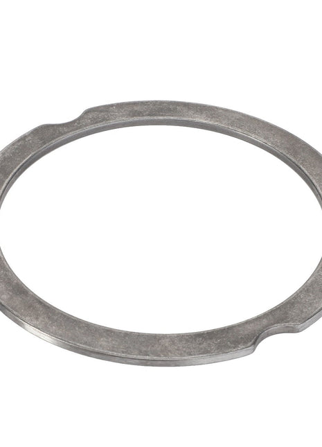 The AGCO Compensating Ring - F007200210220 is a round metallic washer featuring a flat surface and two small notches on the inner edge.