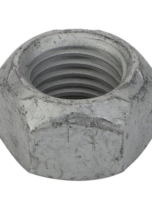 Close-up of the AGCO HEX LOCKNUT - CH6K-3632, a six-sided metal nut with visible threading and a slightly worn surface. It is silver in color.