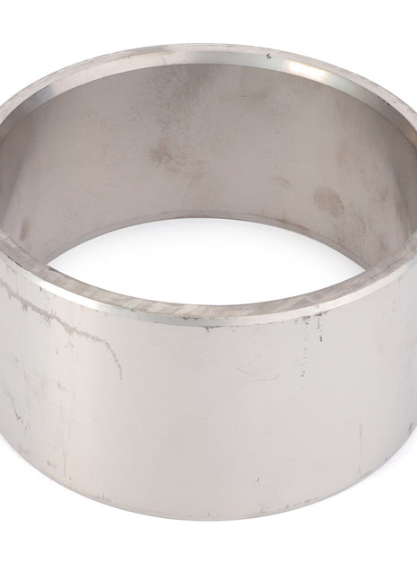 The AGCO Bushing (F718301020020) is a bronze cylindrical metallic ring featuring a smooth inner surface and a slightly worn outer surface, making it ideal for use in various mechanical applications.