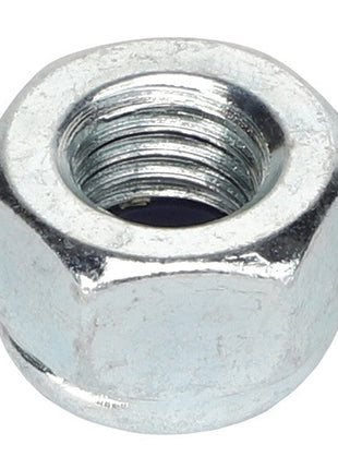 A close-up image of the AGCO LOCKNUT - AL5011554, a metal hex nut featuring a threaded interior and a plain exterior surface, typically used for securing bolts.