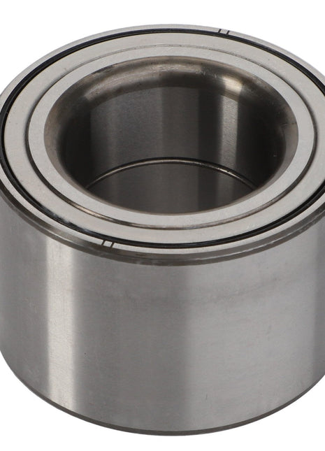 The AGCO | Ball Bearing - Acw4047400 from AGCO is a cylindrical metal component featuring a smooth outer surface and a grooved inner ring, commonly utilized to minimize friction in rotating machinery parts. Please note that no additional current product description information is available.