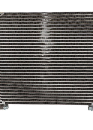 The AGCO Oil Cooler - Acw409444A is a metal heat exchanger with a grid-like design, featuring vertical pipes on the sides and bolts at the bottom for mounting. No current product description information is available.