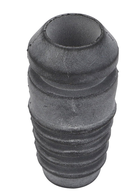 The AGCO | Drain Plug - Acw1022050 is a black rubber bellows with ridges, resembling a compact cylindrical tube with an opening at one end.