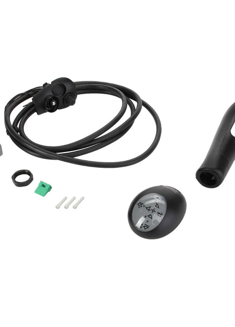 This image showcases the AGCO | KNOB - AL5021042, a bicycle shifter set featuring a shifter cable with housing, lever, adjustment ring, green connector, and three small white plastic pieces. Please note that no current product description information available captures all specific details.