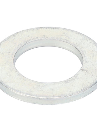 A flat, circular metal washer with a central hole, viewed from an angle. Currently, there is no detailed description available for the AGCO Flat Washer - Va023081 product.