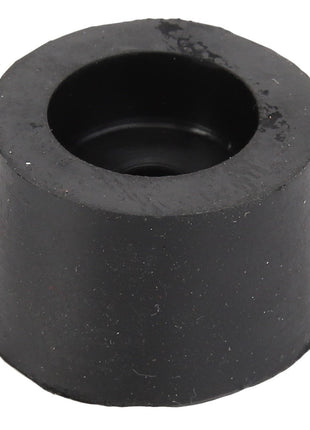 The AGCO BUFFER - D46481200, a black rubber bumper with a cylindrical shape and hollow center, exhibits slight wear and surface texture. No additional product description information is available.