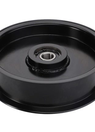 Introducing the AGCO TENSIONER PULLEY - ACY1560320, a black metal pulley featuring a central bearing and smooth edges, expertly crafted by AGCO for seamless mechanical motion transfer.