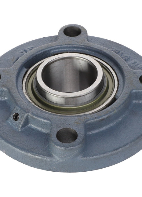 AGCO | Bearing Assembly - Acw1830600, a round, blue metallic bearing housing featuring a central cylindrical opening and four bolt holes, designed for precision alignment.