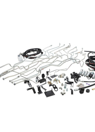 Introducing the AGCO Kit, Pipe - Acw0176220: A meticulously curated collection of automotive parts including metal pipes, brackets, hoses, and fittings from the renowned brand AGCO, all elegantly arranged on a pristine white background.