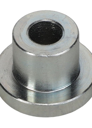 The AGCO SLEEVE - ACP0410750 is a metal spacer with a cylindrical body and a central hole, all set neatly on a wider flat base.