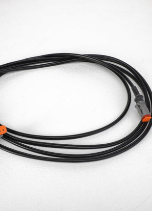 The AGCO | HARNESS - ACP0426710 is a coiled black cable featuring two orange connectors on a white background, making it an ideal addition to your current product lineup. For any queries or assistance, please reach out to our support team.