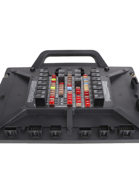 AGCO Module - Acx003572C: A black vehicle fuse box with a handle from AGCO, featuring various colored fuses and connectors arranged in organized rows and columns.