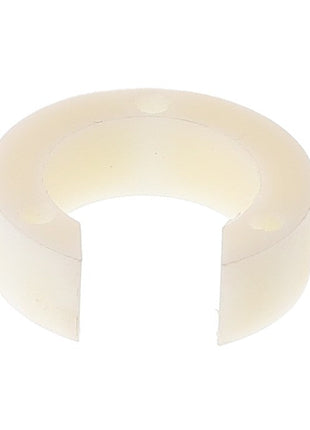 The AGCO SPACER - ACW1042530 is a white semi-circular plastic ring featuring a gap on one side, likely intended for use in mechanical or plumbing applications. Further product description details are not available at this time.