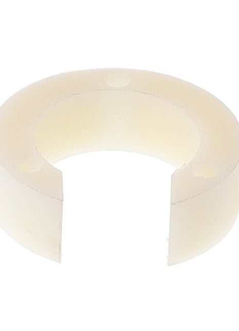 The AGCO SPACER - ACW1042530 is a white semi-circular plastic ring featuring a gap on one side, likely intended for use in mechanical or plumbing applications. Further product description details are not available at this time.