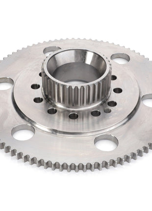 A metallic annular gear with a central hub, featuring multiple holes and teeth around its edge, likely used in industrial or mechanical applications, AGCO's Ring Gear Carrier - F737300020060 exemplifies durability and precision engineering.