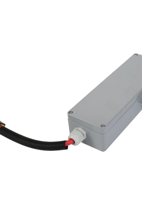 No current product description available for the AGCO Fuse Box - Acp0327640, a rectangular metal enclosure with a length of corrugated wire attached, featuring connectors at both ends.