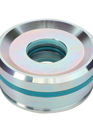 Introducing the AGCO | GUIDE BUSH - F931860030030 by AGCO: a cylindrical metallic mechanical part featuring a hollow center and multiple circular grooves, with a reflective surface that shimmers with hints of blue and green.