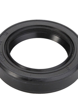 The AGCO | Oil Seal - ACY9601060, a genuine product from AGCO, is expertly crafted from durable black rubber. Its circular shape and inward-facing lip ensure both reliability and performance, while the text engraved on the outer edge adds a touch of detail.