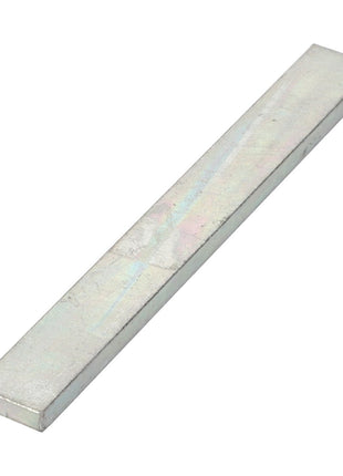 A rectangular metallic flat bar with a smooth, reflective surface, shown against a white background. This product is the AGCO Shim - La300018297 from AGCO. No current product description available for this item.