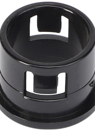 The AGCO Height Control Valve, model AG727025, is a cylindrical black plastic component featuring square cutouts around the sides. It is designed likely for holding or encasing another part. Note that no further product description information is currently available.