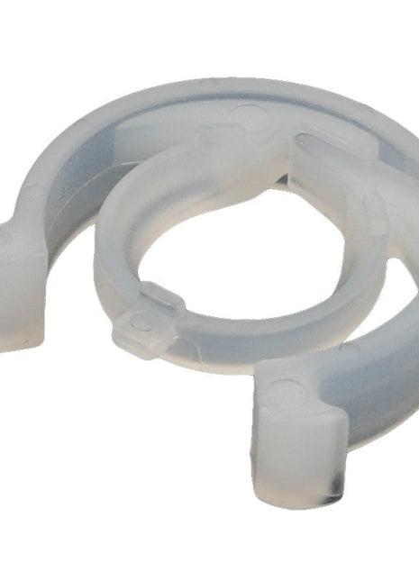 The AGCO | Clip - Acp0446180 is a transparent plastic pipe clip featuring a circular design with two protruding hooks on either side. No current product description available.