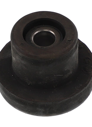 An AGCO | RUBBER - AG601276 black rubber bushing with a metal sleeve in the center, commonly utilized as a vibration isolator in automotive or industrial machinery applications.