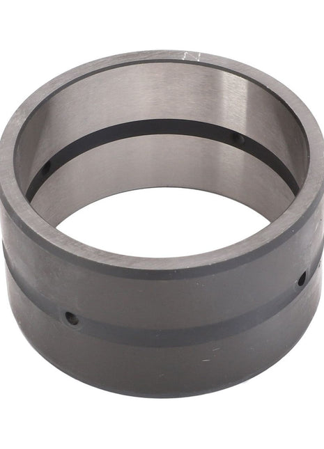 The AGCO | Bush - 3796372M2 is a cylindrical metal component featuring a hollow center and two dark stripes around its circumference, potentially serving as a mechanical part or bearing, making it suitable for Fendt Fitment.