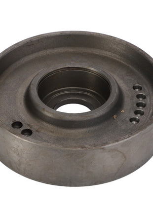 A circular, metallic automotive part with a central hole and multiple smaller holes around its inner edge is shown. Product Name: AGCO | Belt Tensioner - La320810050. Brand Name: AGCO.