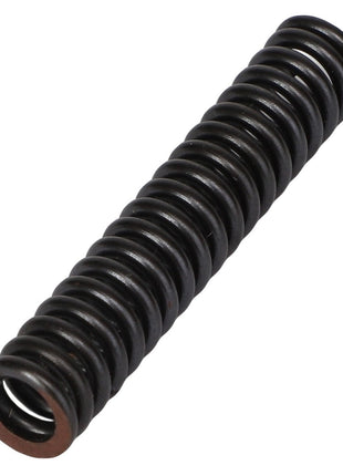 A black, cylindrical metal spring (Product: AGCO | SPRING - AG133562) rests horizontally on a white background. Current product information is provided by the brand AGCO.