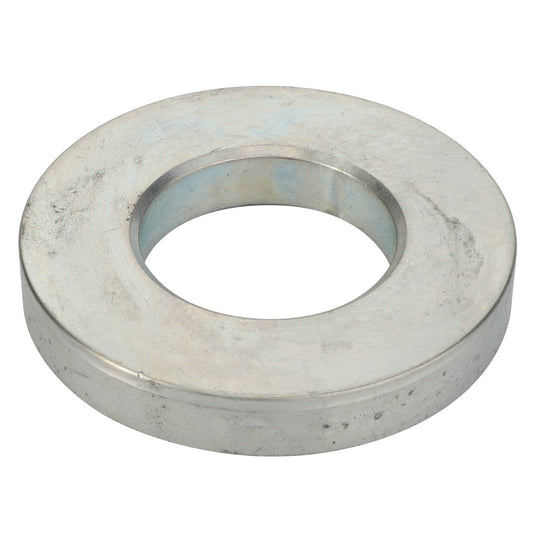 The AGCO | WASHER - D28150131 is a silver metallic washer with a central circular hole, utilized in various mechanical and structural applications. No current product description information is available.