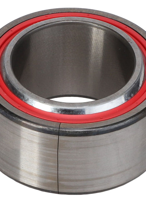 The AGCO Spherical Bearing - Acw1097380 features a cylindrical design with a durable metal exterior and a distinctive red rubber seal on the interior. Currently, additional product description details are not available.