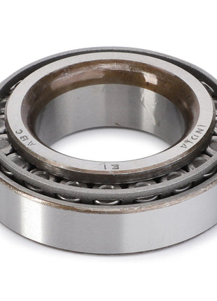 The AGCO Taper Roller Bearing - 1851800M91 is a metal bearing featuring an inner and outer race, visible rollers, and markings on the outer race. It is ideal for Massey Ferguson Models.