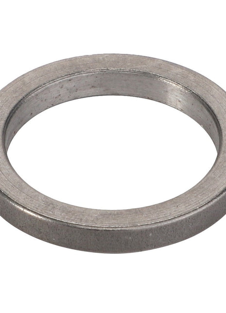 A close-up image of the AGCO Disc (F119200710400) metallic washer with a smooth surface, viewed from a slightly angled perspective.