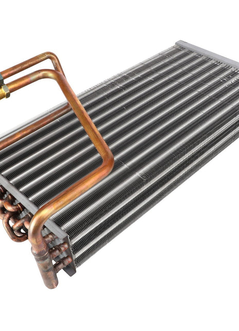 A close-up image of the AGCO Evaporator - AG330764, featuring multiple copper tubes and fins, designed to enhance performance in Heating and Air Conditioning systems.