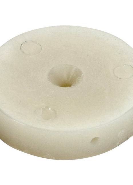 A round, off-white plastic disc with a central hole and three evenly spaced smaller holes around it. Product Name: AGCO | Disc - La300125840, Brand: AGCO. No Product Description Available.