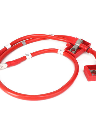 The AGCO Positive Battery Cable, branded under AGCO as model Acw1396130, is a red electrical cable with attached connectors that features a rectangular terminal block and ring terminals at each end.